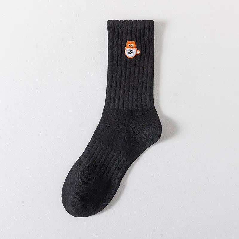 Calcetines bordados icónicos