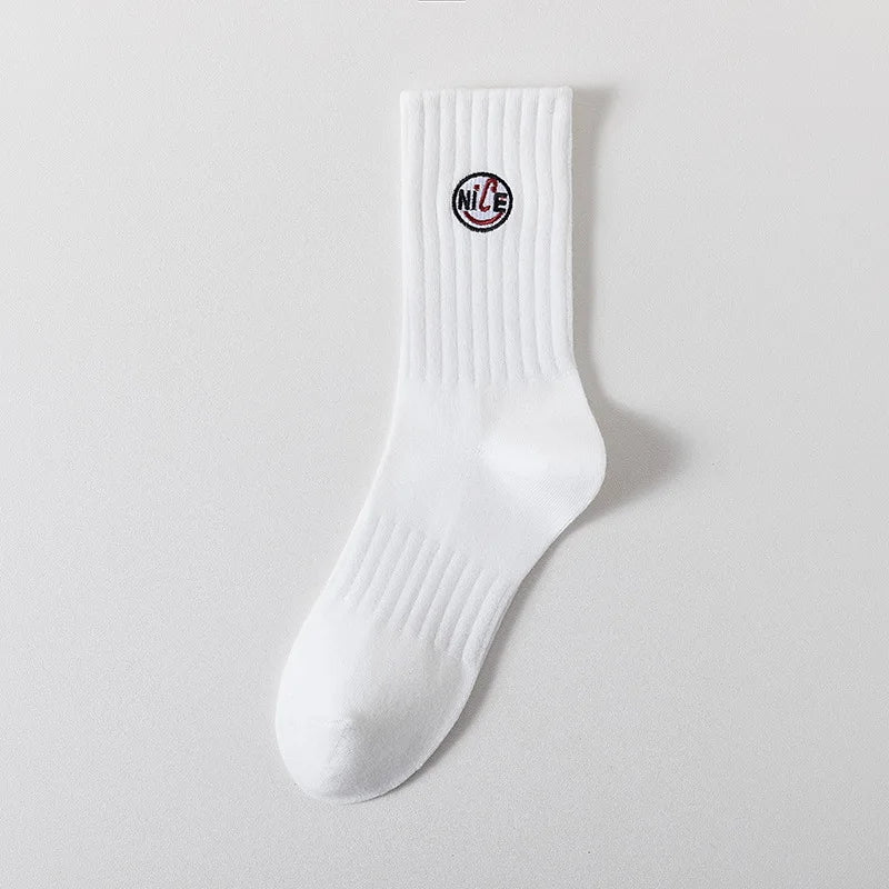 Calcetines bordados icónicos