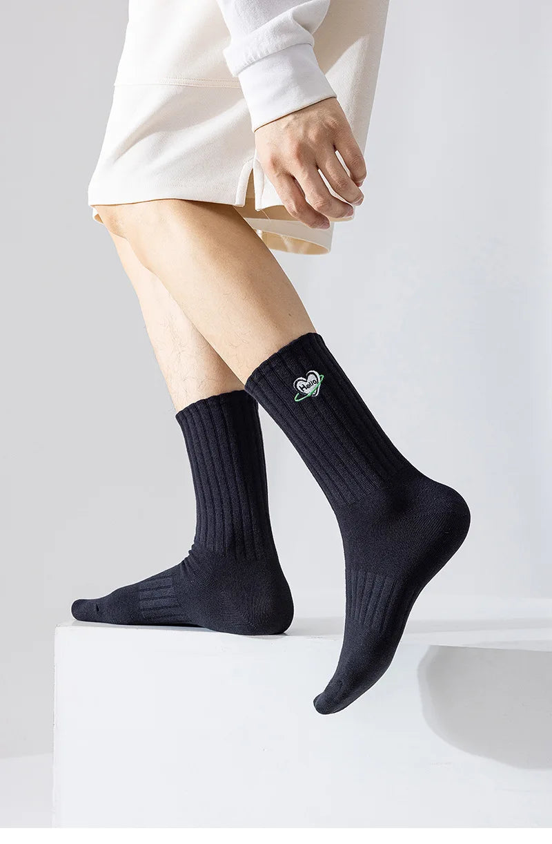 Calcetines bordados icónicos